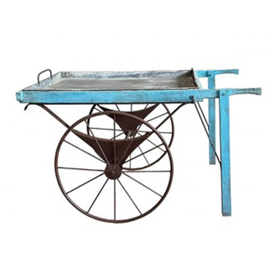 Load image into Gallery viewer, Vintage-style cart with blue frame and rustic wheels on a white background