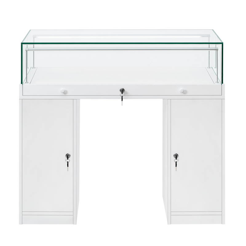 Load image into Gallery viewer, A white desk style retail display unit with a lockable glass top and two lockable cupboards.