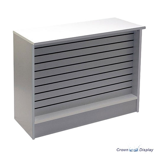 a recessed slatted front display counter for retail sales, available in various width and finishes