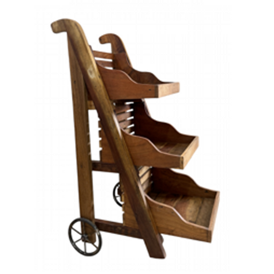 Rustic wooden hand cart with trays on a white background