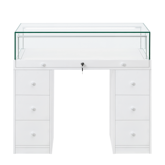 A white desk style retail display unit with a lockable glass top and storage drawers.